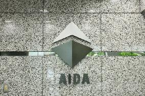 AIDA ENGINEERING signage and logo